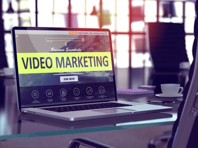 Video Marketing Concept. Closeup Landing Page on Laptop Screen  on background of Comfortable Working Place in Modern Office. Blurred, Toned Image. 3d render.